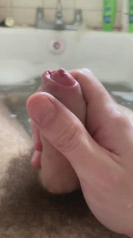 Foreskin pullback in bath