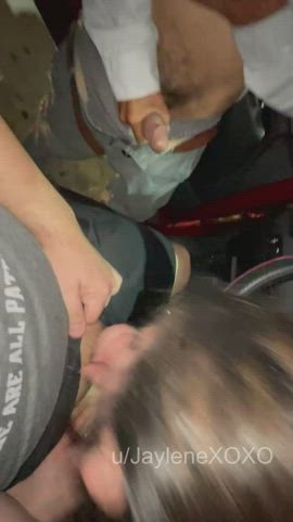 Sucking my husband's cock at a sex shop parking lot while strangers gathered around