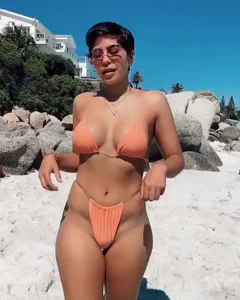 Nadia Jaftha in orange bikini