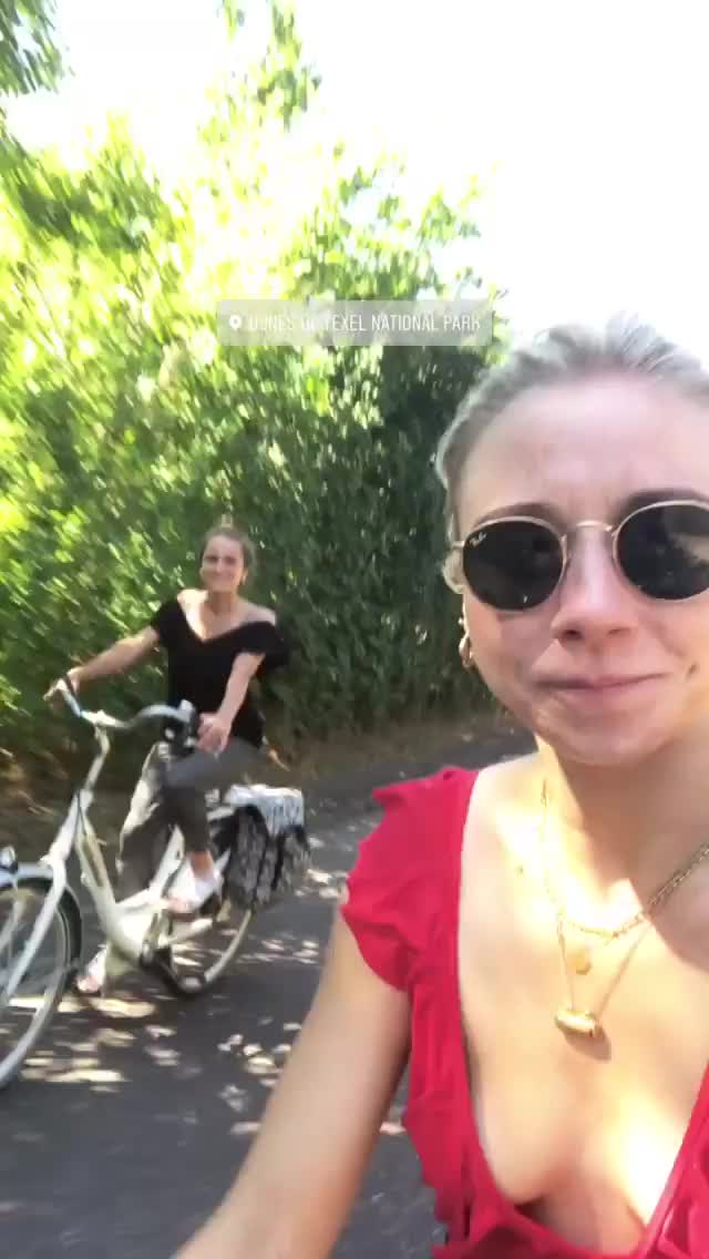 michelle van kempen riding bike little cleavage 
