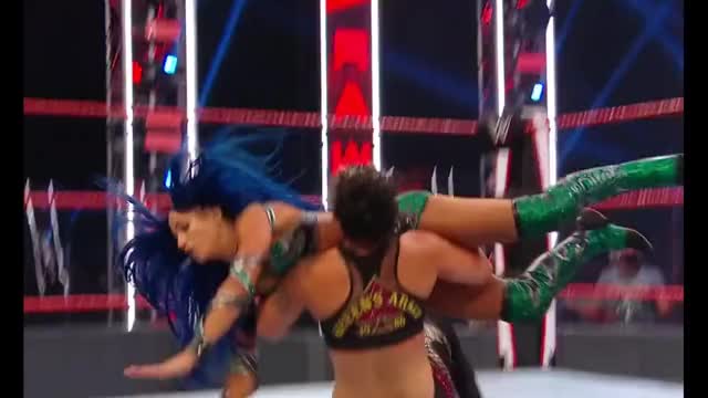 Shayna Baszler holds Sasha Banks ass