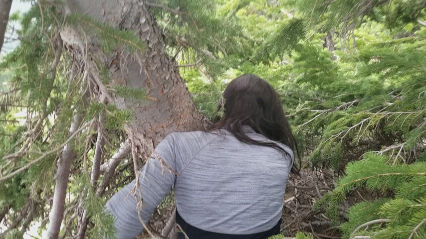 Just 20 feet off the hiking trail... bending over for a good look at the local flora!