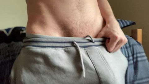 my big, thick cock bursts out of these sweatpants