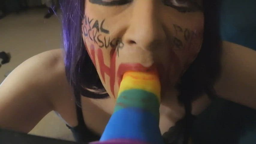 Practicing on a rainbow dildo for pride. More practice = more feminization.
