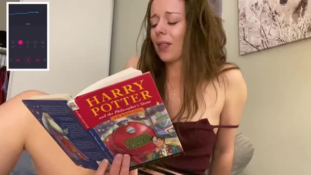 Reading Harry Potter with a vibe inside her