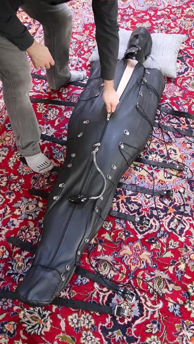 Leather sleepsack orgasm