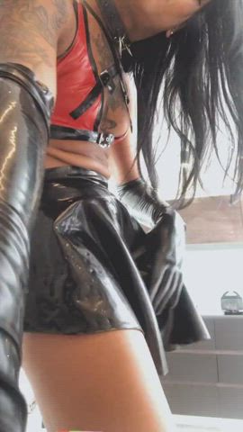 Brazilian Babe Isabella Exposing her Cock from under her Latex Skirt