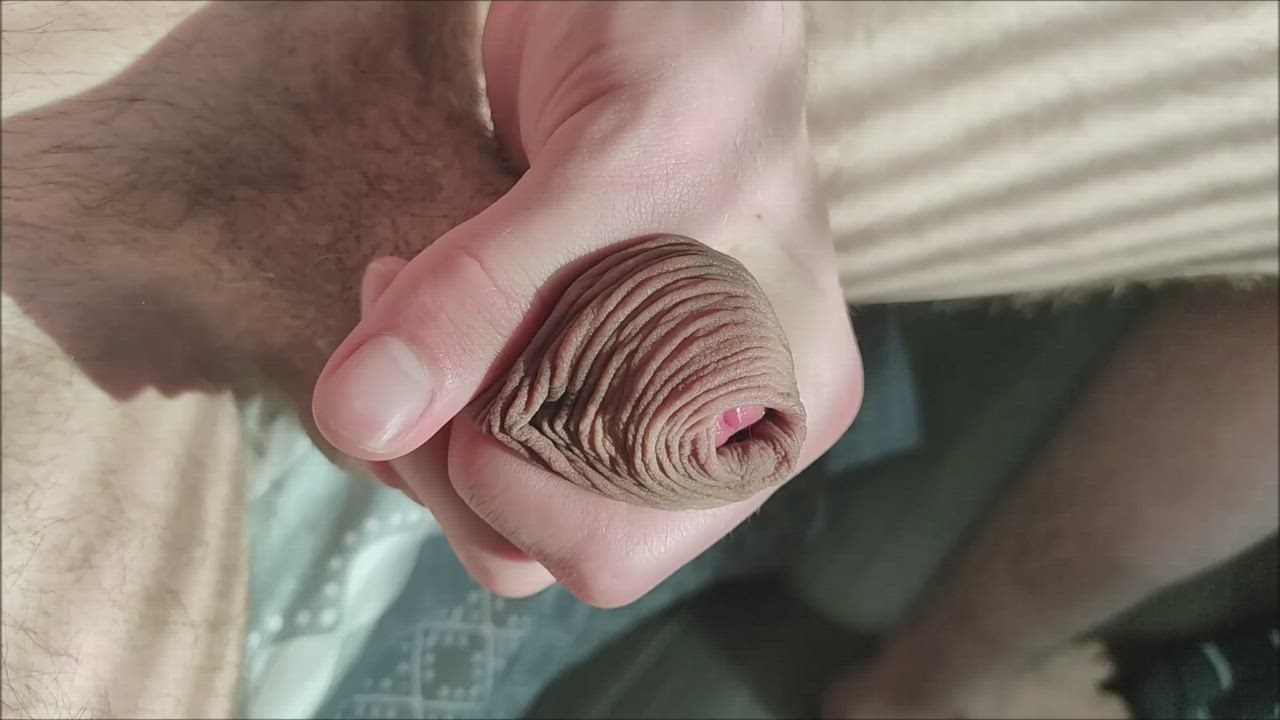 Playing with my foreskin and rolling it back