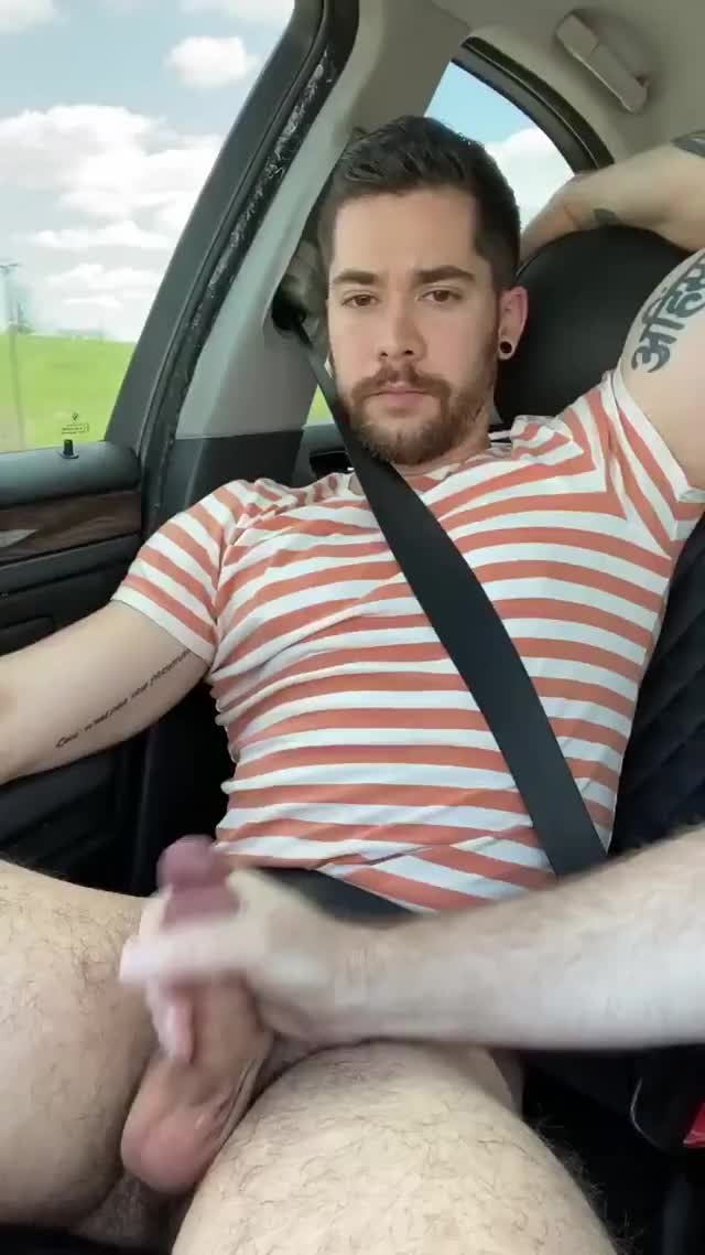 Cumming at the car