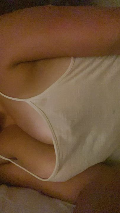 Bouncing in a white tank top [f]