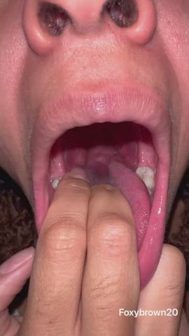 close up ebony spit throat tongue fetish clip
