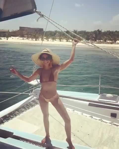 sarah hyland - social media - 2019-04 - dancing on a boat in a tiny bikini 1
