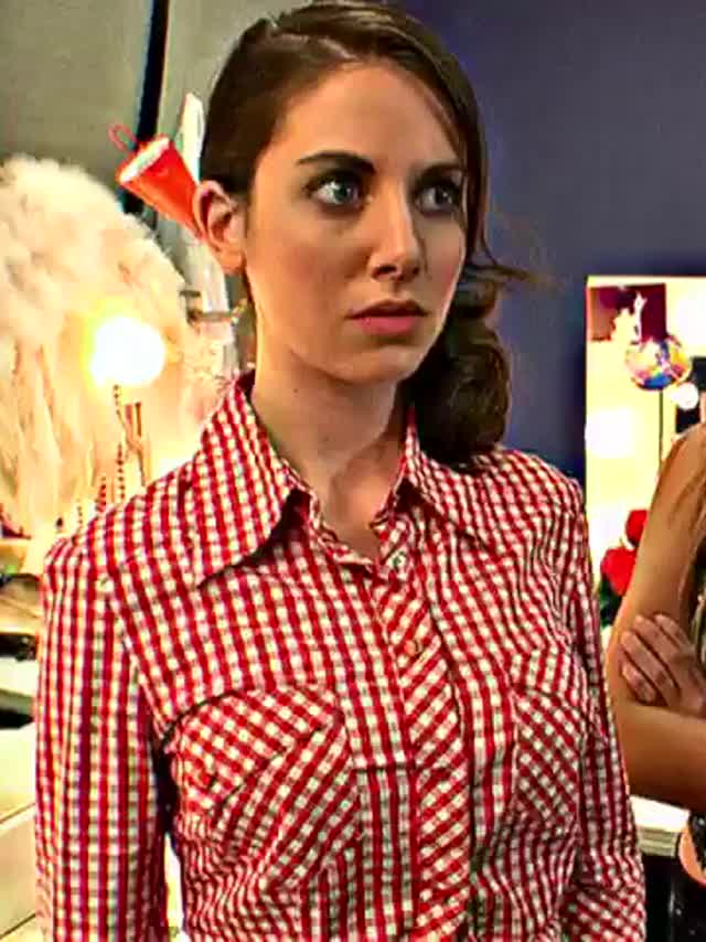 Alison Brie's shirt is ripped open to show off her tits