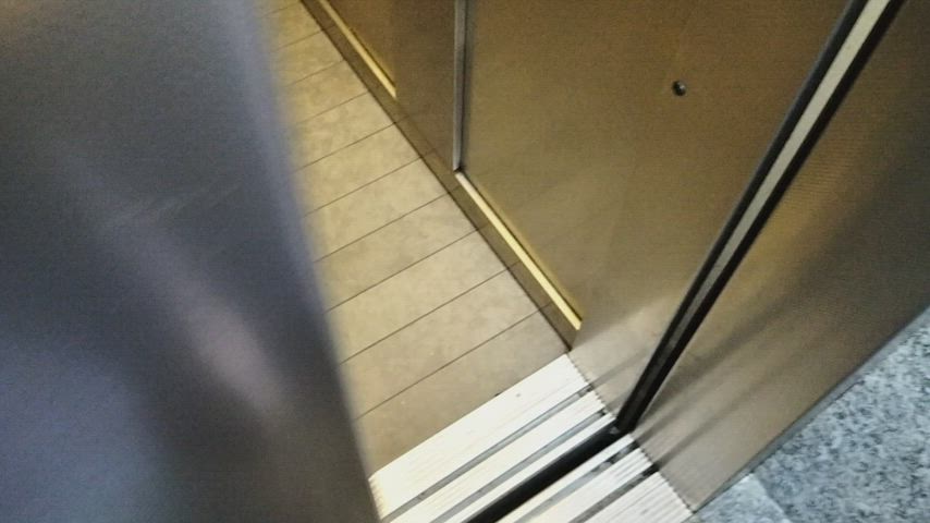 Public cumshot in elevator (uncut cock)