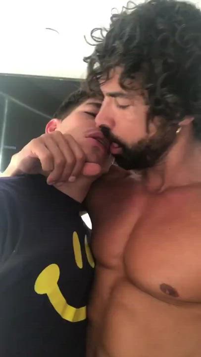 Gay men kiss