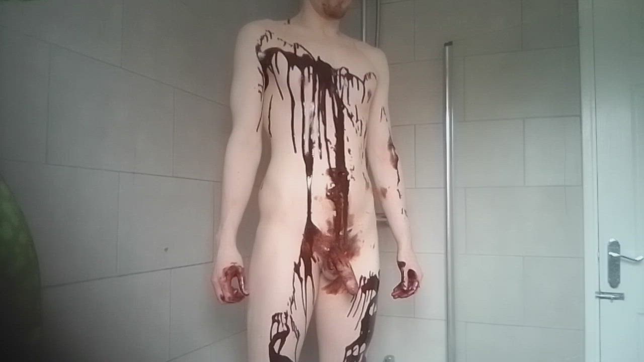 Masturbating and having a massive cumshot, whilst covered in melted chocolate. More