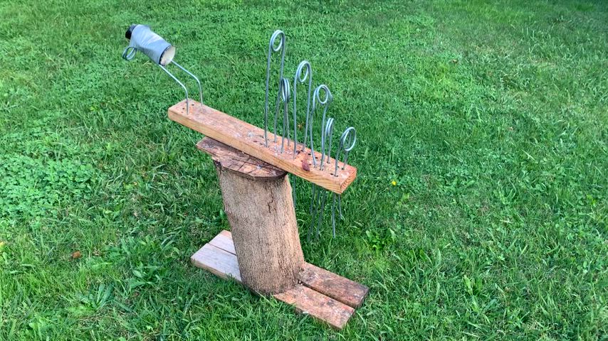 The mobile wank stump with rings of various diameters. Heavy wood stump and skis