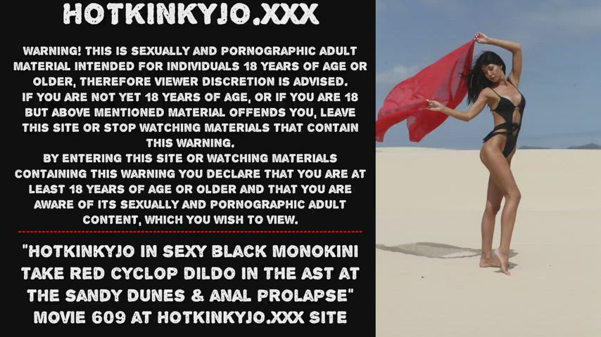 Hotkinkyjo in sexy black monokini take red cyclop dildo in the ass at the sandy dunes