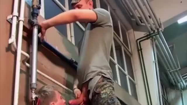 Two German soldiers punish skaters for spraying a wall
