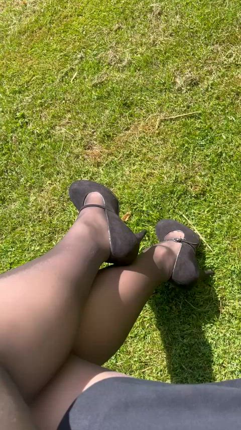 Cute dolly heels and tights in the park