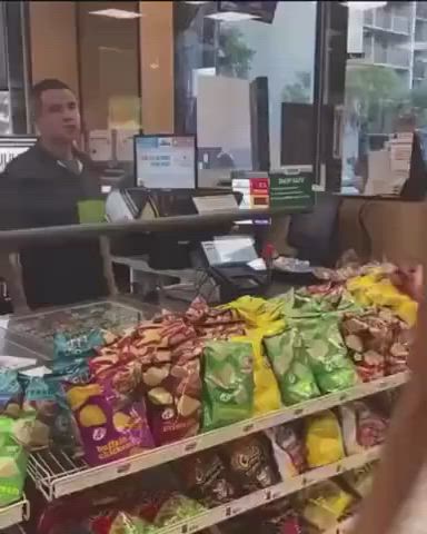 Flashing her boobs to the cashier [00:11]