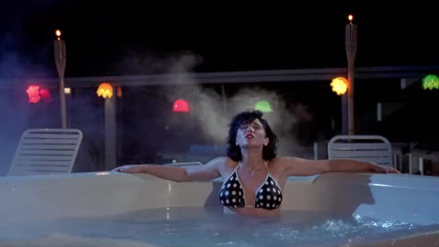 Charlie Spradling - Ski School (1990) - hot tub scene in bikini top, as a guy spies