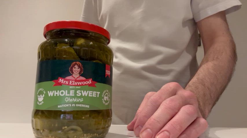 Opening a jar of pickles