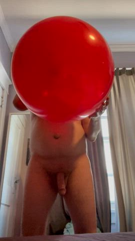 Rubbing a tight Q24” balloon against my cock; and moaning and precumming since