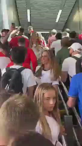 An English fan shows her boobs after England win in the world cup