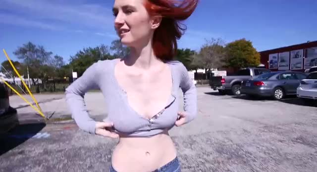 busty-redhead-flashing-her-tits-in-public-area