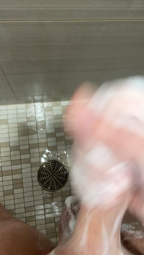 So much cum wasted in the gym shower while I stroked my big [45] soapy cock. Should’ve