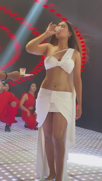 Shameless Bitch Nia Sharma Doing Sperm Shots and Displaying her Brown Thighs Shining