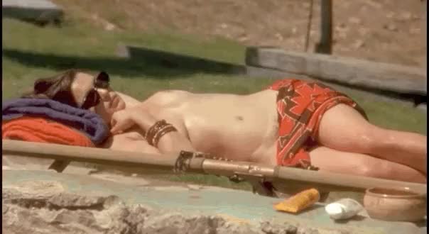Rachel Weisz topless tanning