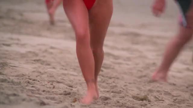 Nicole Eggert - Baywatch - S4E1 - running & walking on beach in red swimsuit