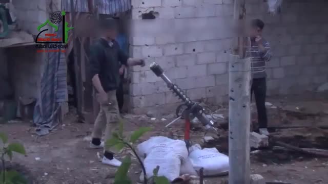 Syrian Rebels engage regime positions with an interesting homemade cannon