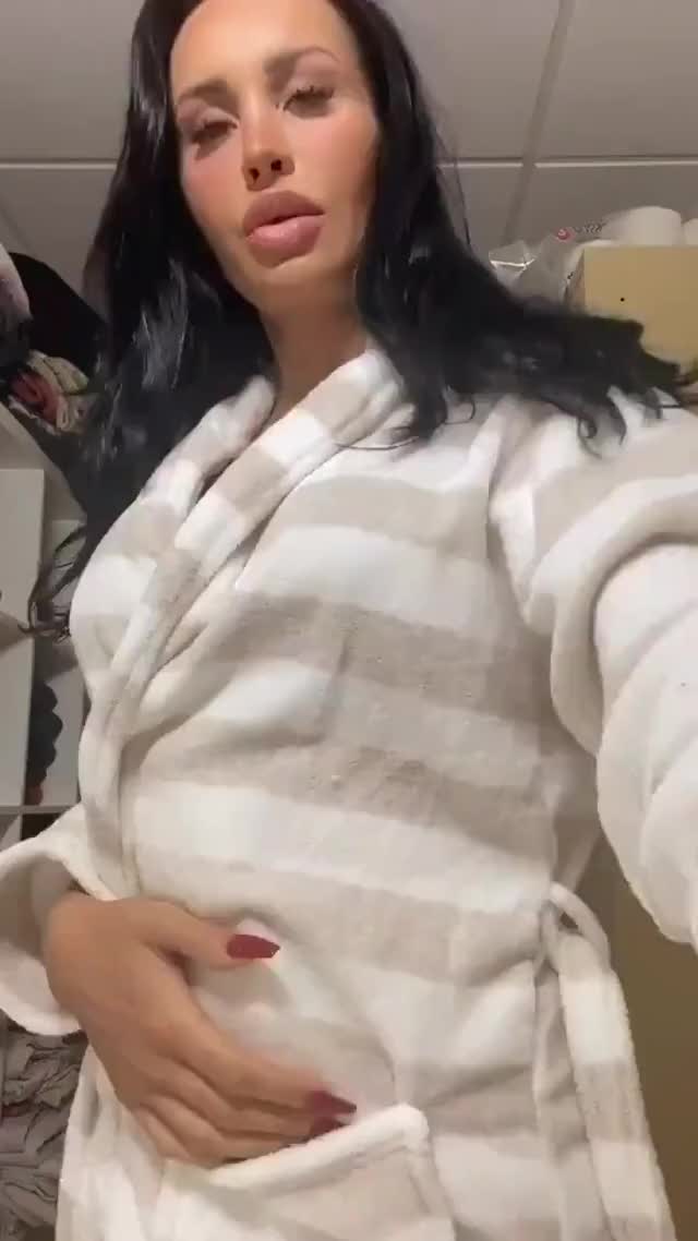 Nothing under her robe, just a huge uncut cock. TS Kimberlee (gif)