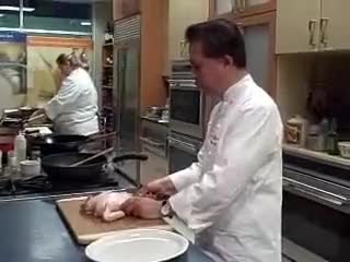 Martin Yan carves chicken in 18 secs.