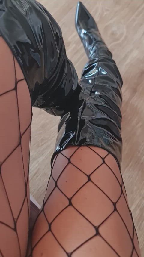 Fishnets and boots...always hot