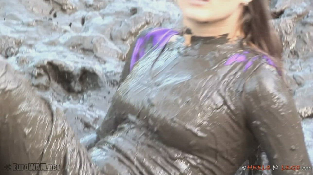 She looks so happy to smear mud into her hair