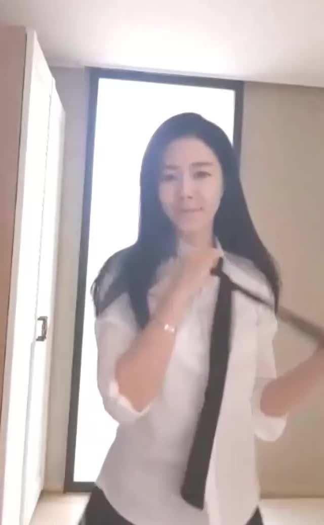 Asian Schoolgirl Tease and Strip