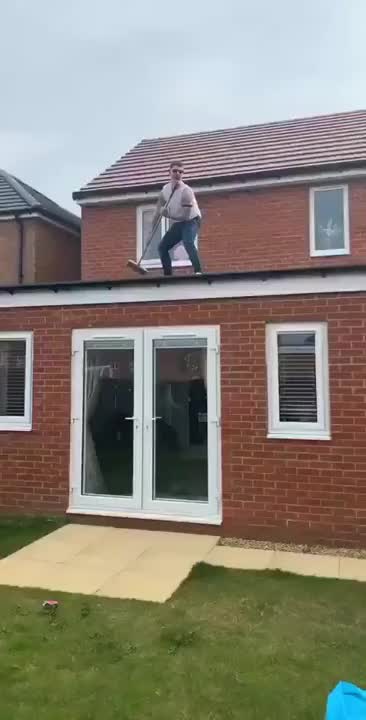 This family absolutely losing it as Freddie Mercury  works the crowd from his rooftop