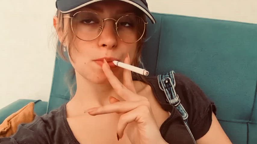 Sexy smoking in a ball cap
