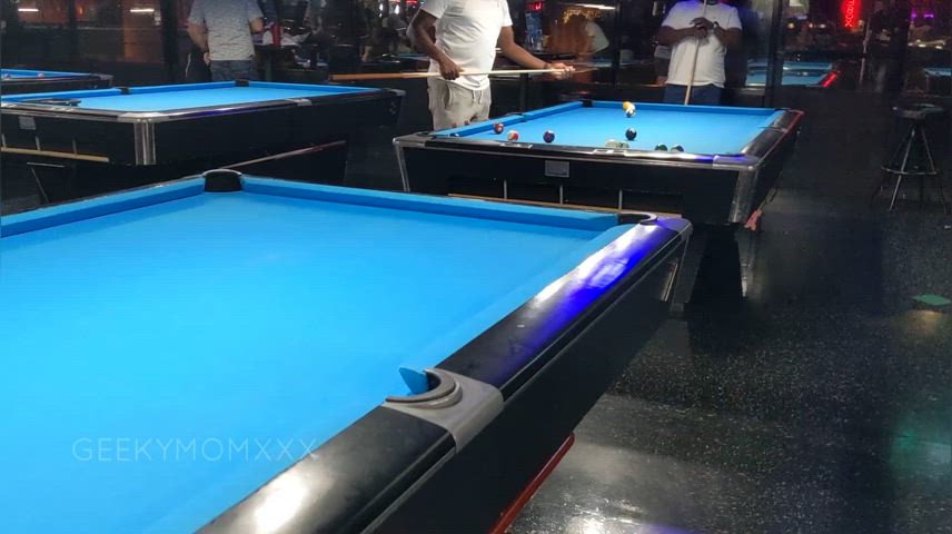 Giving the guys at the pool hall a show