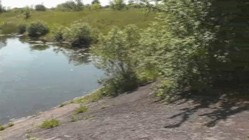 Brunette MILF Masturbating pussy down by the river Outdoor