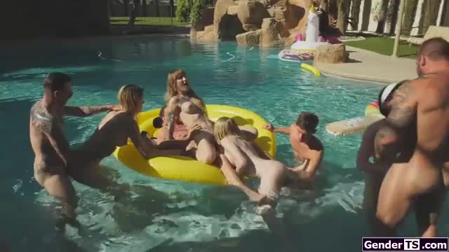 Four shemales in an anal pool group orgy