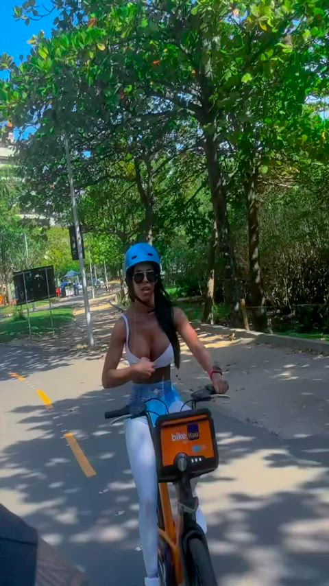 Showing my boobs while riding a bicycle