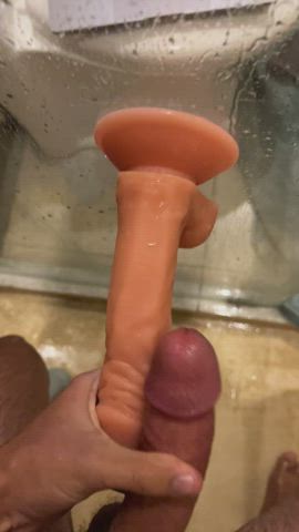 Frotting a dildo in the shower for my first time