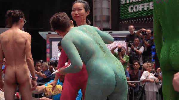 Fully Naked asian lady being painted in public
