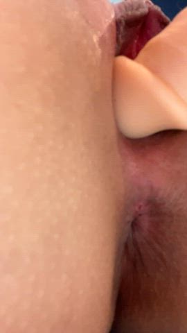 Close up dildo ass insertion
