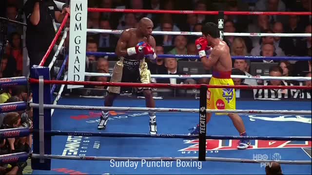 Manny Pacquiao tags Floyd Mayweather with a huge left, and then turns up the heat